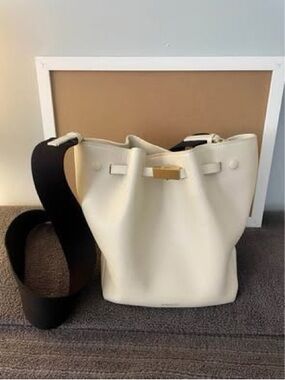 DeMellier Cream Bucket Bag with Wide Black Strap